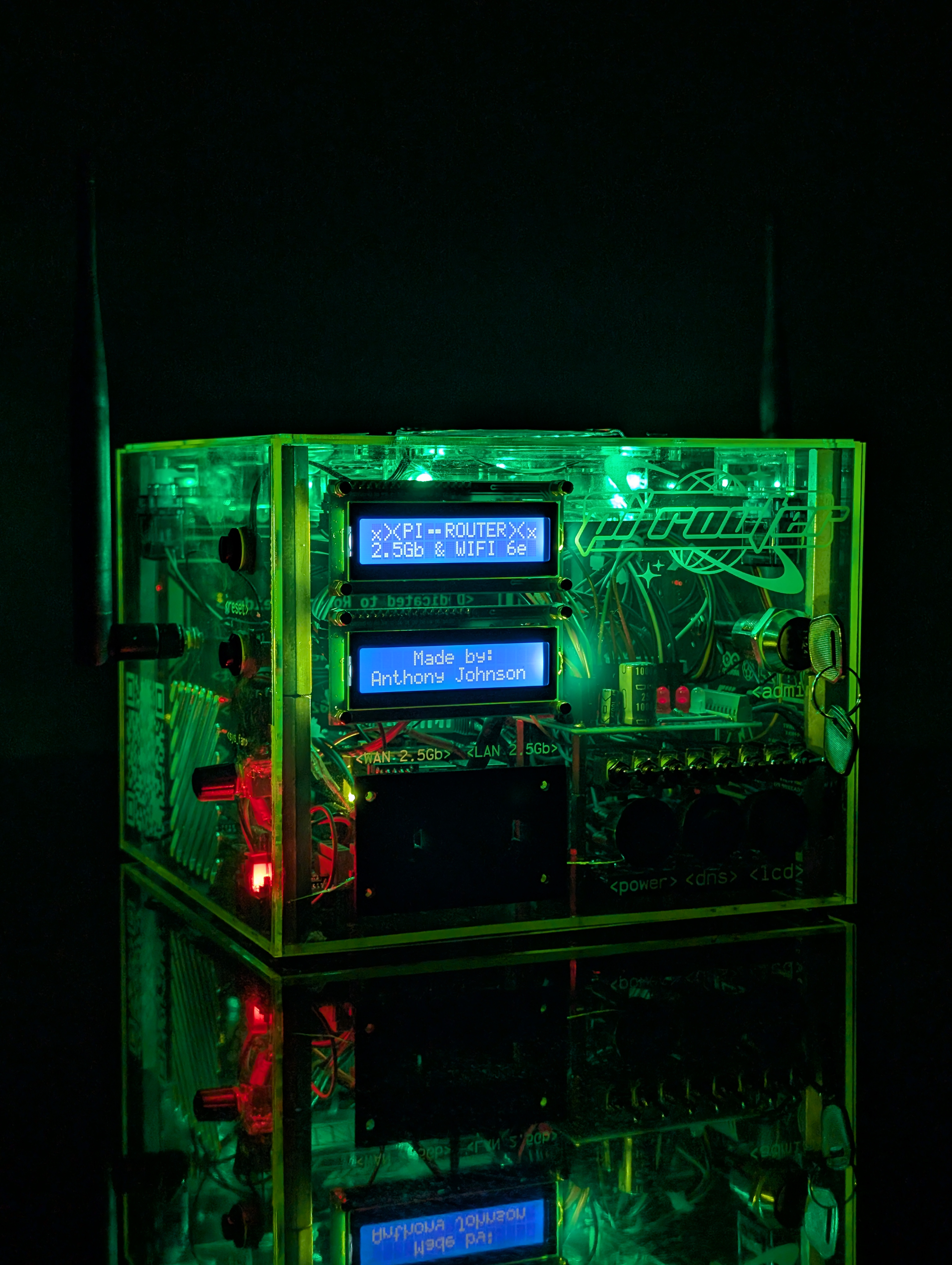 The pi-router glowing in the dark from the green LEDs and the flourescent acrylic